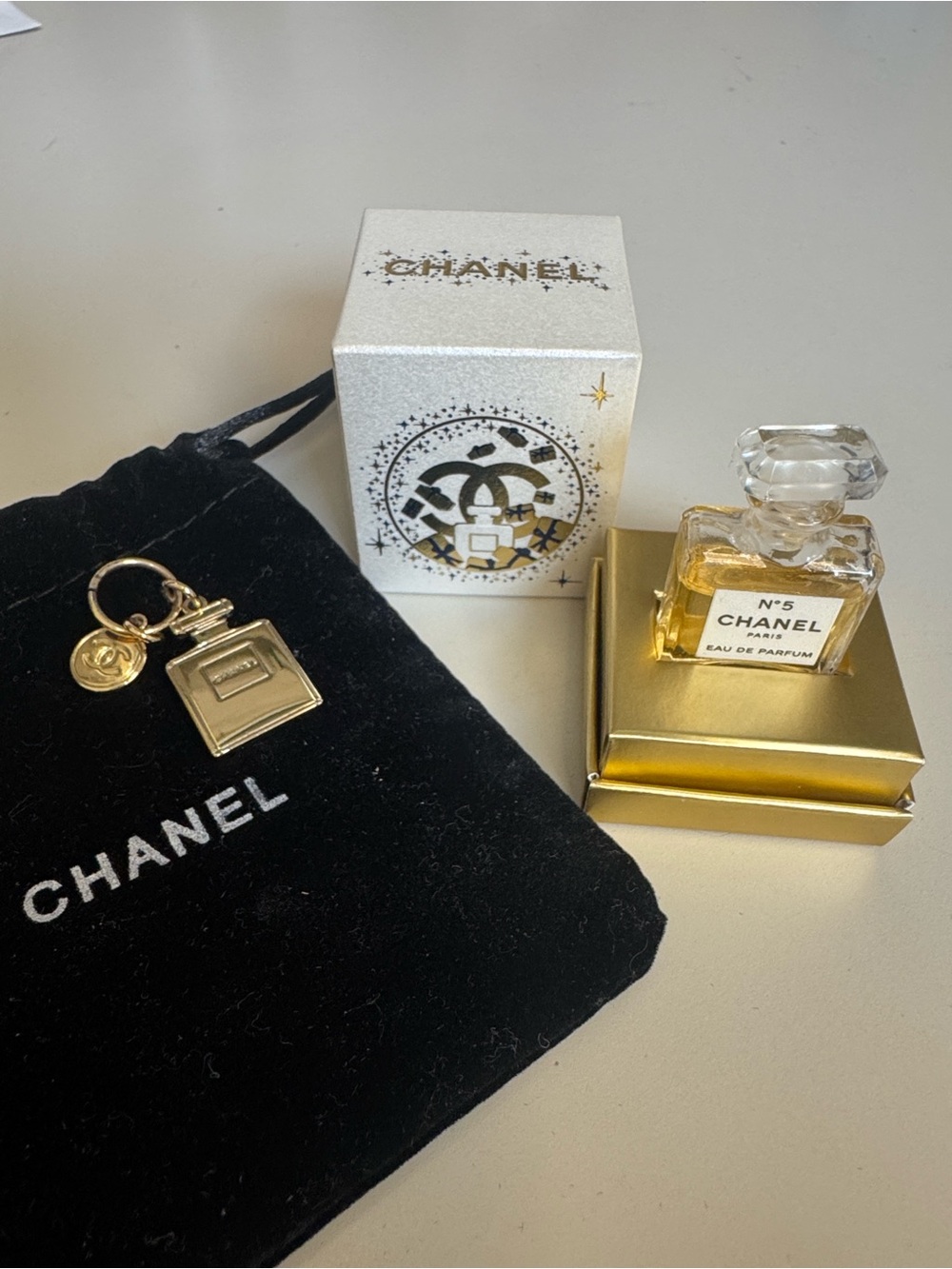 CHANEL Charm Set with Black Velvet Pouch and Chanel Number 5 1.5 ml.